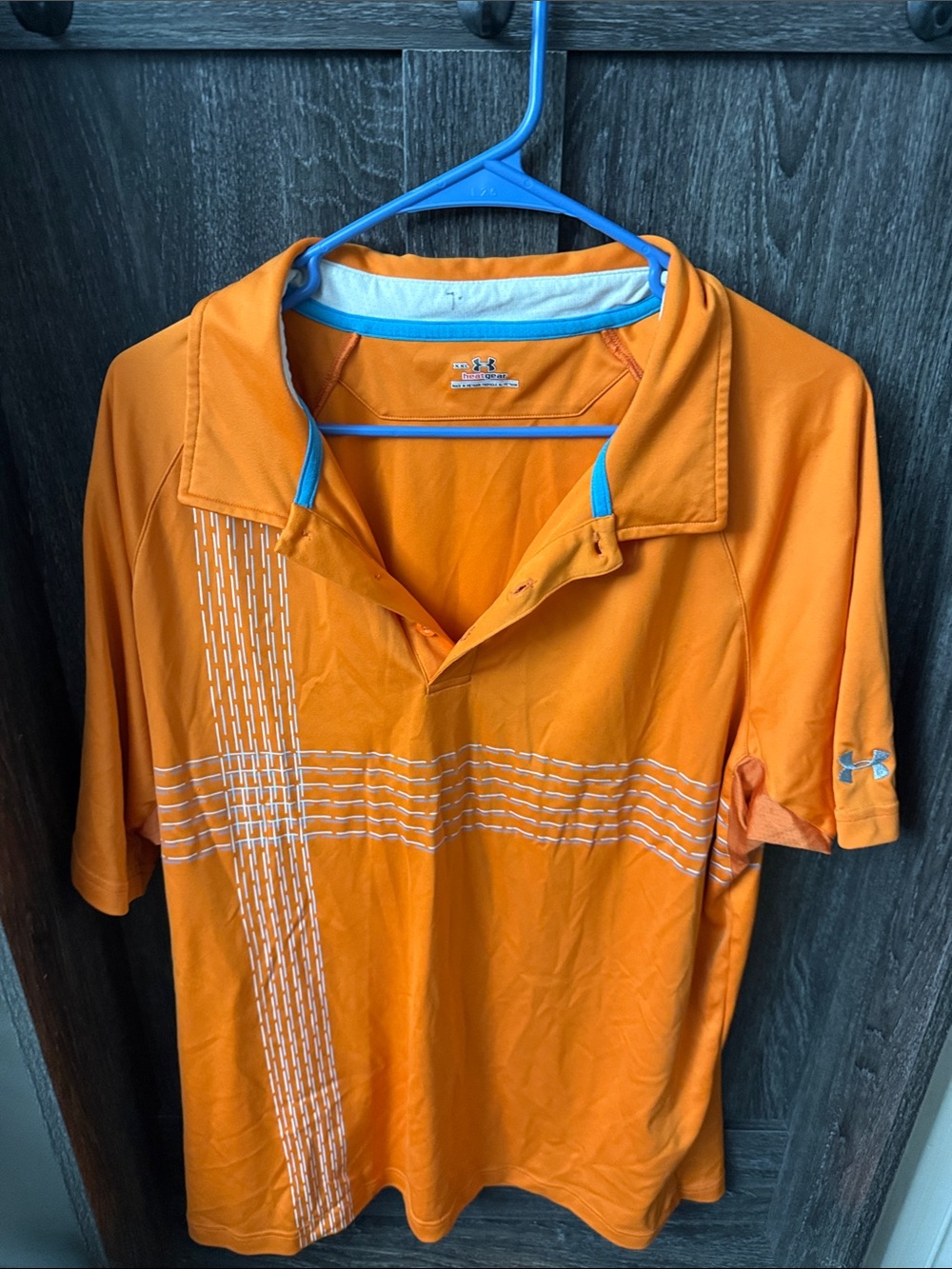 Under Armour Men’s Orange Polo with White Stripe Accents
